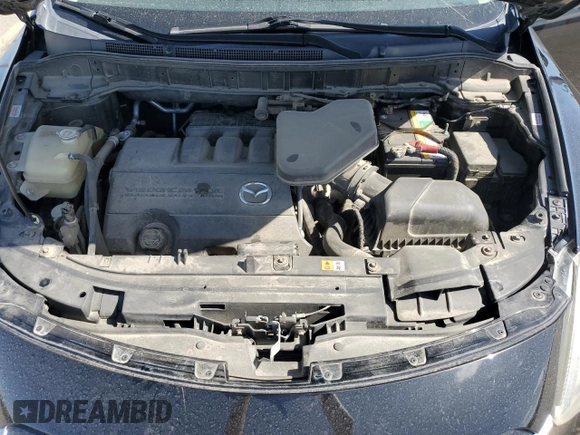 2015 Mazda CX-9 Touring z VIN JM3TB3CV1F0460073, wystawiony jako Copart lot #53841725 z przebiegiem 87 520 mil mil oraz Szkoda całkowita • Salvage title. Historia ofert i sprzedaży dostępna na DreamBid. Obrazek 12.