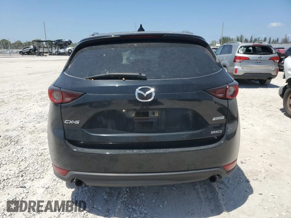 2018 Mazda CX-5 Touring with VIN JM3KFACM2J1327725, listed as a Copart auction lot 54894765 with 56,194 mi miles and Salvage Title. Bid and sale history available at carsss.com. Image 6.