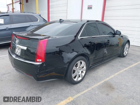2011 Cadillac CTS Luxury with VIN 1G6DF5EYXB0103430, listed as a IAAI auction lot 42105337 with 205,069 mi miles and . Bid and sale history available at DreamBid. Image 4.