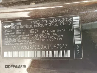 2010 MINI Convertible with VIN WMWMR3C50ATU97547, listed as a Copart auction lot 44780185 with 91,194 mi miles and Salvage Title. Bid and sale history available at DreamBid. Image 12.