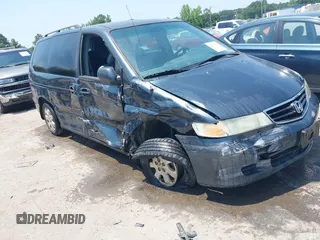 2003 Honda Odyssey EX-L with VIN 5FNRL18933B143909, listed as a IAAI auction lot 42603400 with 254,306 mi miles and . Bid and sale history available at DreamBid. Image 1.