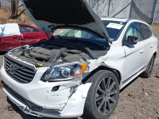 2014 Volvo XC60 R-Design Premier Plus with VIN YV4902DZ8E2545061, listed as a IAAI auction lot 42071863 with 90,718 mi miles and . Bid and sale history available at DreamBid. Image 6.