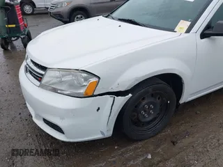 2013 Dodge Avenger SE with VIN 1C3CDZAB1DN646005, listed as a IAAI auction lot 40856048 with 143,386 mi miles and . Bid and sale history available at carsss.com. Image 6.