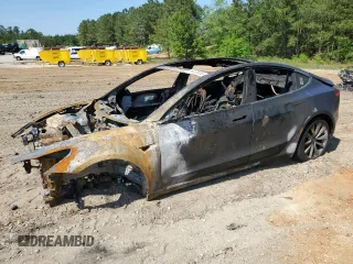 2018 Tesla Model 3 Long Range Battery z VIN 5YJ3E1EB7JF117575, wystawiony jako Copart lot #54418655 z przebiegiem Nie podano mil oraz Szkoda całkowita • Salvage title. Historia ofert i sprzedaży dostępna na DreamBid. Obrazek 1.