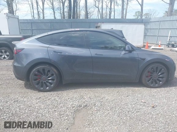 2022 Tesla Model Y Performance with VIN 7SAYGDEF3NF324705, listed as a IAAI auction lot 42076565 with 66,573 mi miles and . Bid and sale history available at DreamBid. Image 13.