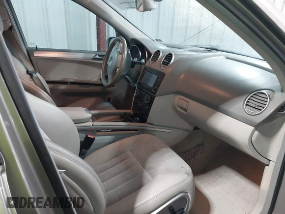 2006 Mercedes-Benz M 350 with VIN 4JGBB86E16A142859, listed as a IAAI auction lot 41867816 with 164,401 mi miles and . Bid and sale history available at DreamBid. Image 5.