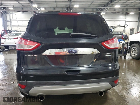 2013 Ford Escape SEL with VIN 1FMCU9HX3DUD40289, listed as a Copart auction lot 60711035 with 166,100 mi miles and Salvage title. Bid and sale history available at DreamBid. Image 6.