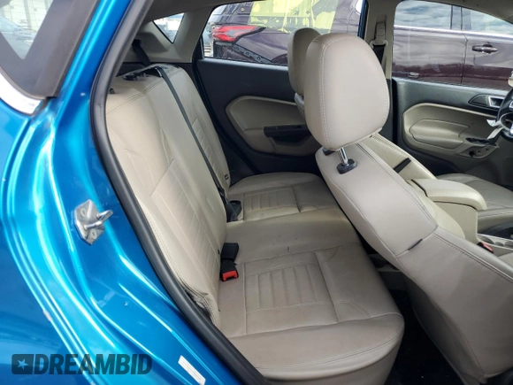 2015 Ford Fiesta Titanium z VIN 3FADP4FJ7FM120958, wystawiony jako Copart lot #85260204 z przebiegiem 144 587 mil mil oraz Szkoda całkowita • Salvage title. Historia ofert i sprzedaży dostępna na DreamBid. Obrazek 10.