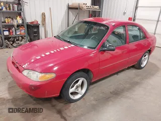 2002 Ford Escort Fleet Standard with VIN 3FAFP13P22R217224, listed as a IAAI auction lot 42032180 with 182,234 mi miles. Bid and sale history available at carsss.com. Image 2.