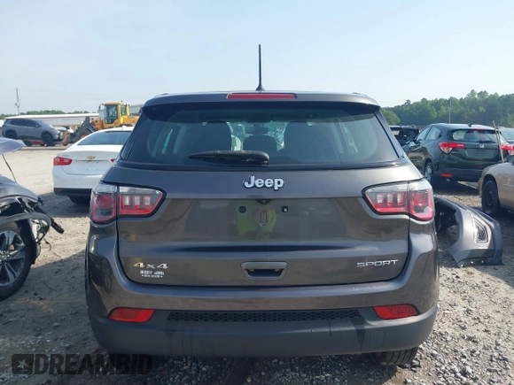 2018 Jeep Compass Sport with VIN 3C4NJDAB2JT136225, listed as a IAAI auction lot 42279668 with 145,967 mi miles and . Bid and sale history available at DreamBid. Image 17.