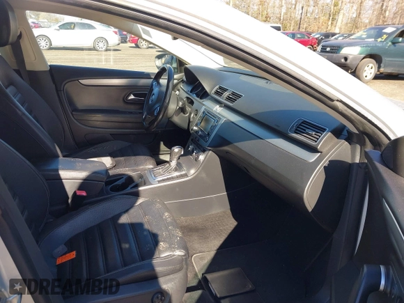 2013 Volkswagen CC Lux z VIN WVWRN7AN2DE506840, wystawiony jako IAAI lot #41843448 z przebiegiem 152 344 mil mil oraz . Historia ofert i sprzedaży dostępna na DreamBid. Obrazek 5.