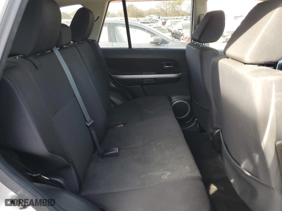 2012 Suzuki Grand Vitara Premium with VIN JS3TE0D23C4100795, listed as a Copart auction lot 83554304 with 135,097 mi miles and Salvage Title. Bid and sale history available at carsss.com. Image 12.