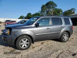 2011 Honda Pilot Touring z VIN 5FNYF4H95BB095476, wystawiony jako Copart lot #58842505 z przebiegiem 258 989 mil mil oraz Czysty tytuł • Clean title. Historia ofert i sprzedaży dostępna na DreamBid. Obrazek 1.