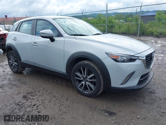 2017 Mazda CX-3 Touring z VIN JM1DKFC7XH0141919, wystawiony jako IAAI lot #42333679 z przebiegiem 93 234 mil mil oraz . Historia ofert i sprzedaży dostępna na DreamBid. Obrazek 1.