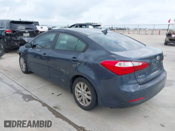 2014 Kia Forte LX with VIN KNAFX4A68E5145665, listed as a IAAI auction lot 42129786 with 192,514 mi miles and . Bid and sale history available at DreamBid. Image 3.