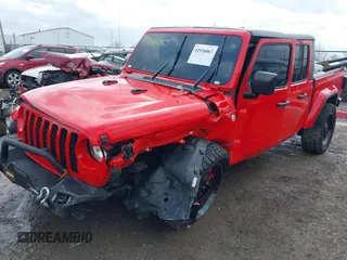 2021 Jeep Gladiator Freedom z VIN 1C6HJTAG0ML547293, wystawiony jako IAAI lot #41926067 z przebiegiem 57 696 mil mil oraz . Historia ofert i sprzedaży dostępna na DreamBid. Obrazek 6.