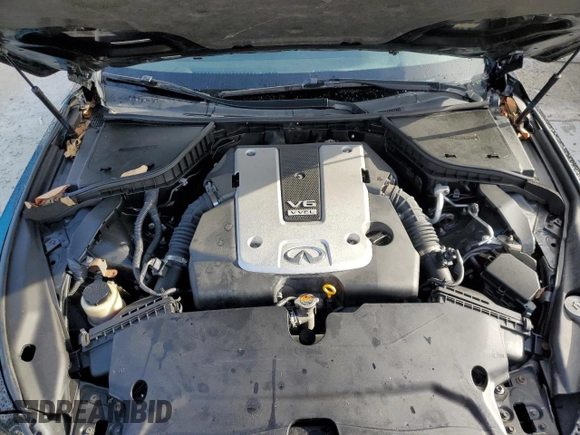 2015 Infiniti Q50 Premium z VIN JN1BV7AR8FM417810, wystawiony jako Copart lot #55492005 z przebiegiem 88 015 mil mil oraz Nie do naprawy • Non repairable. Historia ofert i sprzedaży dostępna na DreamBid. Obrazek 11.