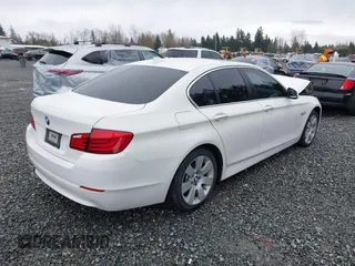 2013 BMW 5 Series 528i xDrive with VIN WBAXH5C54DDW13438, listed as a IAAI auction lot 41851954 with 122,653 mi miles. Bid and sale history available at carsss.com. Image 4.