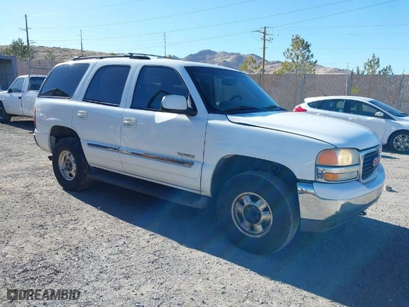 2002 GMC Yukon SLT with VIN 1GKEC13T32R256757, listed as a IAAI auction lot 41657945 with 331,831 mi miles. Bid and sale history available at carsss.com. Image 1.