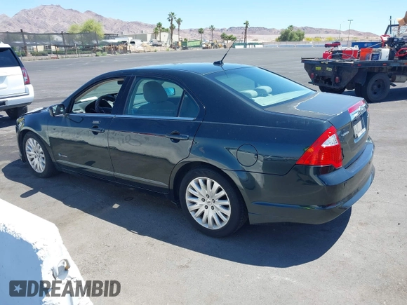 2010 Ford Fusion Hybrid with VIN 3FADP0L36AR355961, listed as a IAAI auction lot 42217637 with 256,817 mi miles and . Bid and sale history available at DreamBid. Image 3.