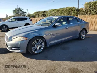 2013 Jaguar XJ with VIN SAJWA1C7XD8V50868, listed as a Copart auction lot 73404534 with 106,979 mi miles and Salvage Title. Bid and sale history available at DreamBid. Image 1.