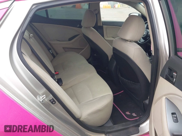 2014 Kia Optima LX z VIN KNAGM4A77E5453187, wystawiony jako IAAI lot #42357588 z przebiegiem 162 501 mil mil oraz . Historia ofert i sprzedaży dostępna na DreamBid. Obrazek 8.