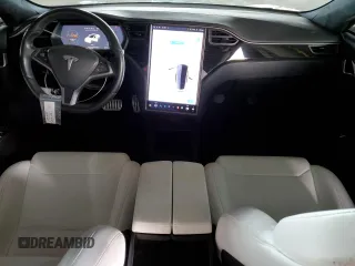 2019 Tesla Model S 100D with VIN 5YJSA1E45KF330633, listed as a Copart auction lot 49329745 with 74,047 mi miles and Salvage title. Bid and sale history available at DreamBid. Image 8.