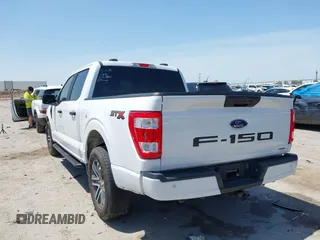 2023 Ford F-150 XL with VIN 1FTEW1CP5PKF42521, listed as a IAAI auction lot 42257062 with 30,758 mi miles and . Bid and sale history available at DreamBid. Image 3.