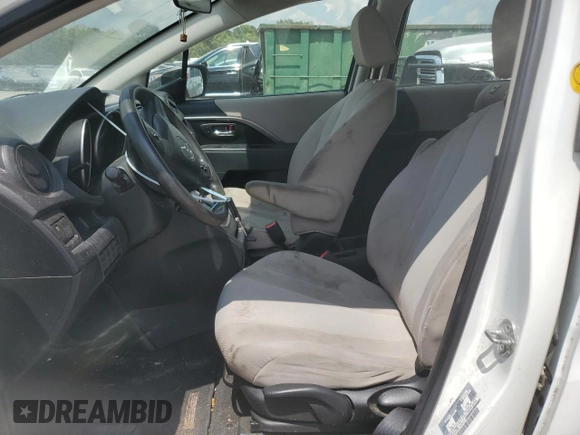 2014 Mazda 5 Sport with VIN JM1CW2BL7E0173729, listed as a Copart auction lot 68676554 with 102,734 mi miles and Salvage Title. Bid and sale history available at DreamBid. Image 7.