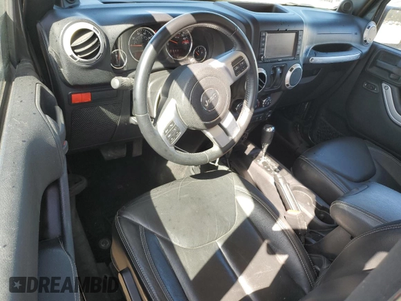 2014 Jeep Wrangler Rubicon with VIN 1C4BJWCG1EL168575, listed as a Copart auction lot 75095814 with 65,770 mi miles and Salvage title. Bid and sale history available at DreamBid. Image 8.