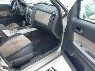 2010 Mercury Mariner Premier with VIN 4M2CN8H72AKJ05699, listed as a IAAI auction lot 41631468 with 205,563 mi miles. Bid and sale history available at carsss.com. Image 5.