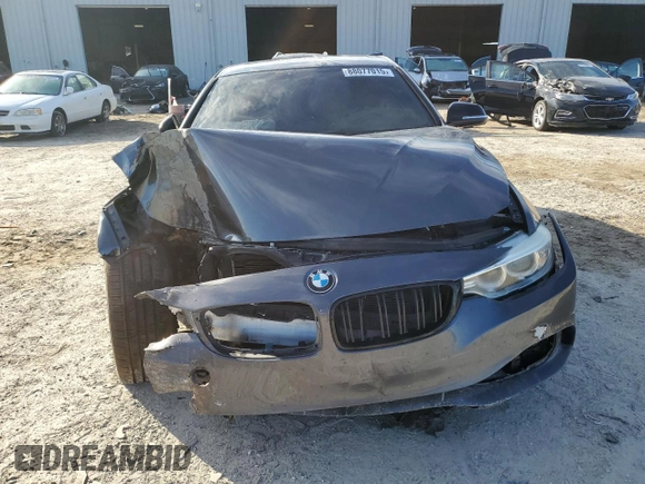 2015 BMW 4 Series 435i xDrive z VIN WBA3R5C56FK371987, wystawiony jako Copart lot #88077015 z przebiegiem Nie podano mil oraz Szkoda całkowita • Salvage title. Historia ofert i sprzedaży dostępna na DreamBid. Obrazek 5.