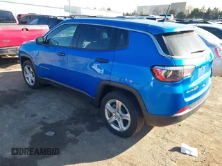 2023 Jeep Compass Sport z VIN 3C4NJDAN6PT548943, wystawiony jako IAAI lot #41631738 z przebiegiem 29 139 mil mil oraz . Historia ofert i sprzedaży dostępna na DreamBid. Obrazek 3.