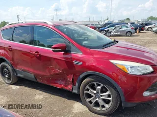 2015 Ford Escape Titanium z VIN 1FMCU9J91FUC58933, wystawiony jako IAAI lot #42583736 z przebiegiem 147 359 mil mil oraz . Historia ofert i sprzedaży dostępna na DreamBid. Obrazek 13.
