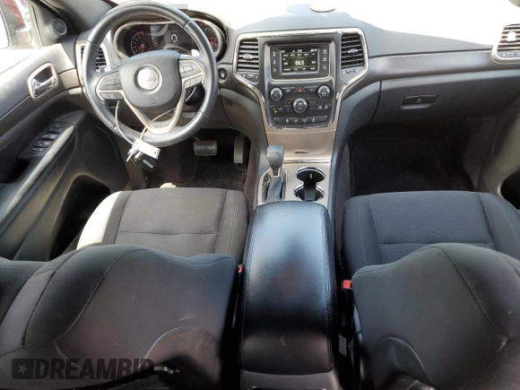 2016 Jeep Grand Cherokee Laredo with VIN 1C4RJFAG8GC413490, listed as a Copart auction lot 62347445 with 104,056 mi miles and Salvage title. Bid and sale history available at DreamBid. Image 8.