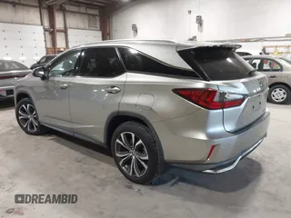 2018 Lexus RX 450hL Premium z VIN JTJDGKCA6J2004313, wystawiony jako IAAI lot #42270567 z przebiegiem 72 692 mil mil oraz . Historia ofert i sprzedaży dostępna na DreamBid. Obrazek 3.