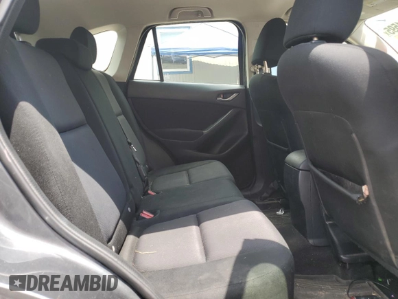 2013 Mazda CX-5 Sport with VIN JM3KE4BE6D0138164, listed as a Copart auction lot 62401595 with 146,305 mi miles and Salvage title. Bid and sale history available at DreamBid. Image 11.