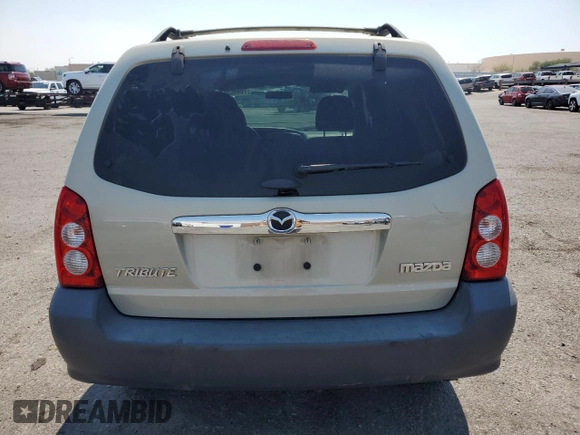 2005 Mazda Tribute i with VIN 4F2YZ02Z65KM01780, listed as a Copart auction lot 70890314 with 119,107 mi miles and Salvage Title. Bid and sale history available at carsss.com. Image 6.