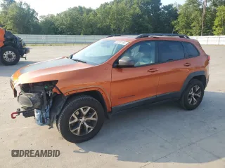 2016 Jeep Cherokee Trailhawk z VIN 1C4PJMBS6GW252974, wystawiony jako Copart lot #63652465 z przebiegiem 160 641 mil mil oraz Szkoda całkowita • Salvage title. Historia ofert i sprzedaży dostępna na DreamBid. Obrazek 1.
