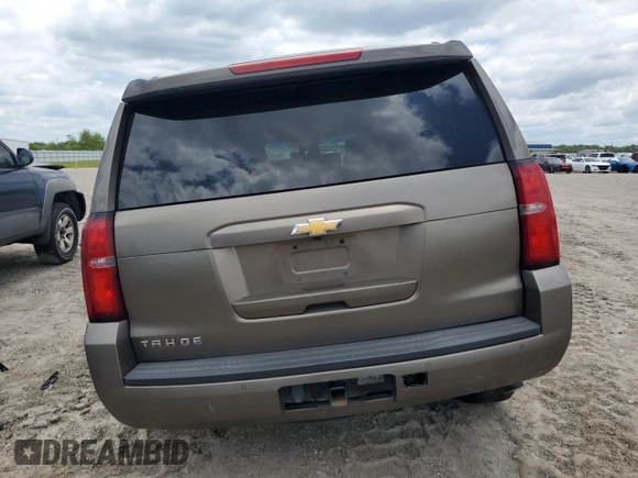 2016 Chevrolet Tahoe LS z VIN 1GNSCAECXGR340617, wystawiony jako Copart lot #56307315 z przebiegiem Nie podano mil oraz Czysty tytuł • Clean title. Historia ofert i sprzedaży dostępna na DreamBid. Obrazek 6.