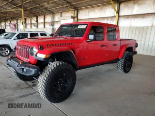 2021 Jeep Gladiator Mojave z VIN 1C6JJTEG5ML550850, wystawiony jako Copart lot #60851975 z przebiegiem 33 039 mil mil oraz Czysty tytuł • Clean title. Historia ofert i sprzedaży dostępna na DreamBid. Obrazek 1.