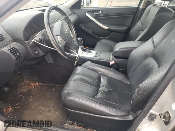 2006 Infiniti G35 z VIN JNKCV51F26M616815, wystawiony jako Copart lot #57521415 z przebiegiem 115 490 mil mil oraz Szkoda całkowita • Salvage title. Historia ofert i sprzedaży dostępna na DreamBid. Obrazek 7.
