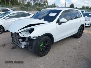 2014 Porsche Cayenne S z VIN WP1AB2A2XELA58986, wystawiony jako IAAI lot #41577501 z przebiegiem 53 672 mil mil oraz . Historia ofert i sprzedaży dostępna na DreamBid. Obrazek 2.
