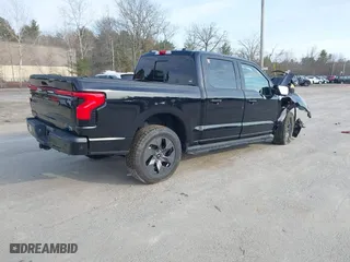 2022 Ford F-150 Lightning Pro with VIN 1FT6W1EV3NWG03970, listed as a IAAI auction lot 41801986 with 29,815 mi miles. Bid and sale history available at carsss.com. Image 4.