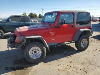 2000 Jeep Wrangler Sport with VIN 1J4FA49S1YP703560, listed as a Copart auction lot 73647844 with 117,300 mi miles and Salvage Title. Bid and sale history available at carsss.com. Image 1.