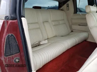 1986 Cadillac Eldorado z VIN 1G6EL5784GU616263, wystawiony jako Copart lot #48741325 z przebiegiem 59 213 mil mil oraz Tytuł czysty. Historia ofert i sprzedaży dostępna na DreamBid. Obrazek 10.