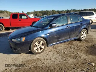 2014 Mitsubishi Lancer SE with VIN JA32V2FWXEU002886, listed as a Copart auction lot 42127265 with 163,847 mi miles and Salvage Title. Bid and sale history available at carsss.com. Image 1.