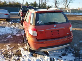 2009 Suzuki SX4 Man Touring Pkg AWD with VIN JS2YB417996202822, listed as a IAAI auction lot 41423724 with 181,531 mi miles. Bid and sale history available at carsss.com. Image 3.