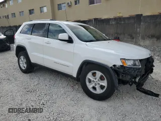 2016 Jeep Grand Cherokee Laredo z VIN 1C4RJEAG6GC390768, wystawiony jako Copart lot #51459885 z przebiegiem 130 690 mil mil oraz Szkoda całkowita • Salvage title. Historia ofert i sprzedaży dostępna na DreamBid. Obrazek 4.