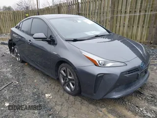 2019 Toyota Prius L Eco z VIN JTDKARFU8K3085918, wystawiony jako IAAI lot #41107891 z przebiegiem 166 295 mil mil oraz . Historia ofert i sprzedaży dostępna na DreamBid. Obrazek 1.